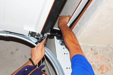 Garage Door Spring Repairs by Adkison Overhead Door LLC